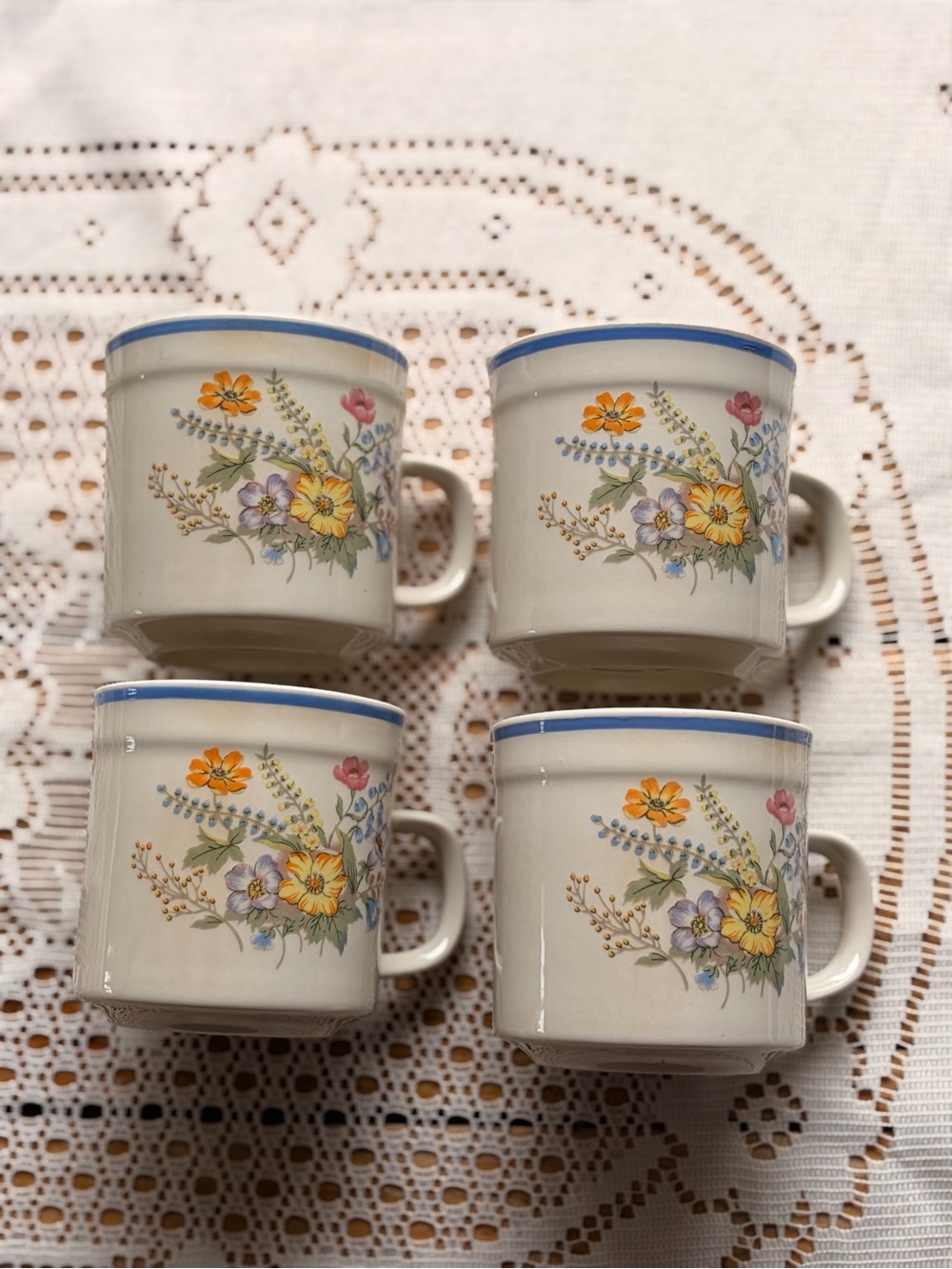 Set of 4 Floral Ceramic Coffee Mugs in Cream with Blue Trim